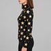 Goldbergh womens Hikari Pully in Black/Gold (Black/Gold) - model side. AI-generated from manufacturer imagery.
