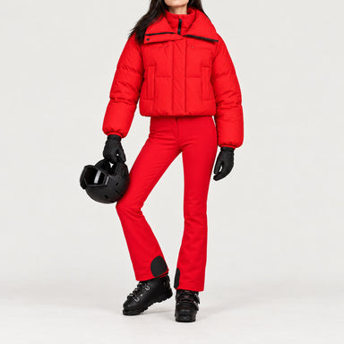 Goldbergh women's Koi Ski Jacket in Flame Red – ski pose view. AI-generated from manufacturer imagery.