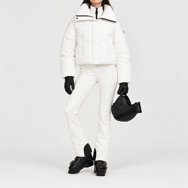 Goldbergh women's Koi Ski Jacket in White – ski pose view. AI-generated from manufacturer imagery.