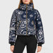 Goldbergh womens Kyoko Ski Jacket (Bandana Paisley Blue) - model front. AI-generated from manufacturer imagery.