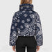 Goldbergh womens Kyoko Ski Jacket (Bandana Paisley Blue) - model back. AI-generated from manufacturer imagery.