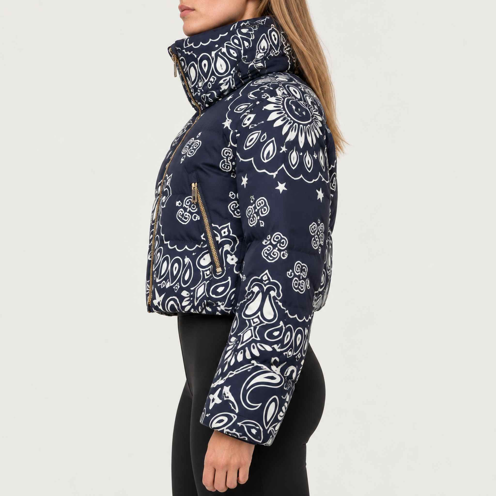 Goldbergh womens Kyoko Ski Jacket (Bandana Paisley Blue) - model side. AI-generated from manufacturer imagery.