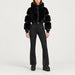 Goldbergh womens Lieke Ski Suit (Black) - model front. AI-generated from manufacturer imagery.