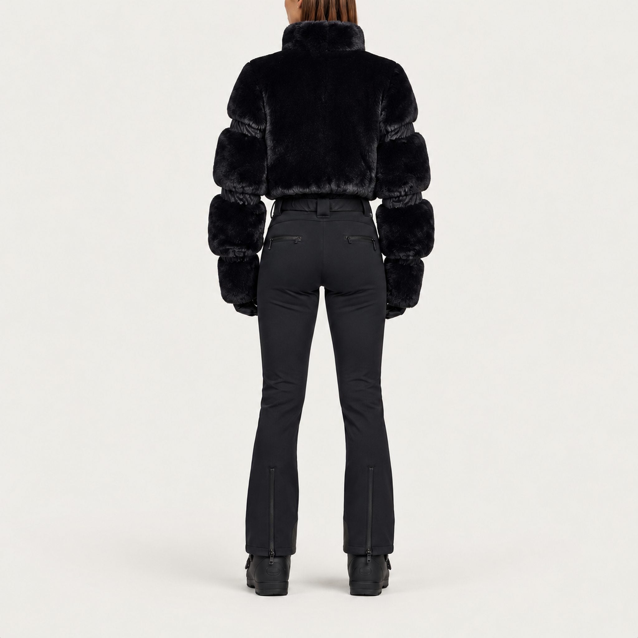 Goldbergh womens Lieke Ski Suit (Black) - model back. AI-generated from manufacturer imagery.
