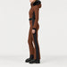 Goldbergh womens Parry Ski Suit in Deep Mocha (Deep Mocha) - model side. AI-generated from manufacturer imagery.