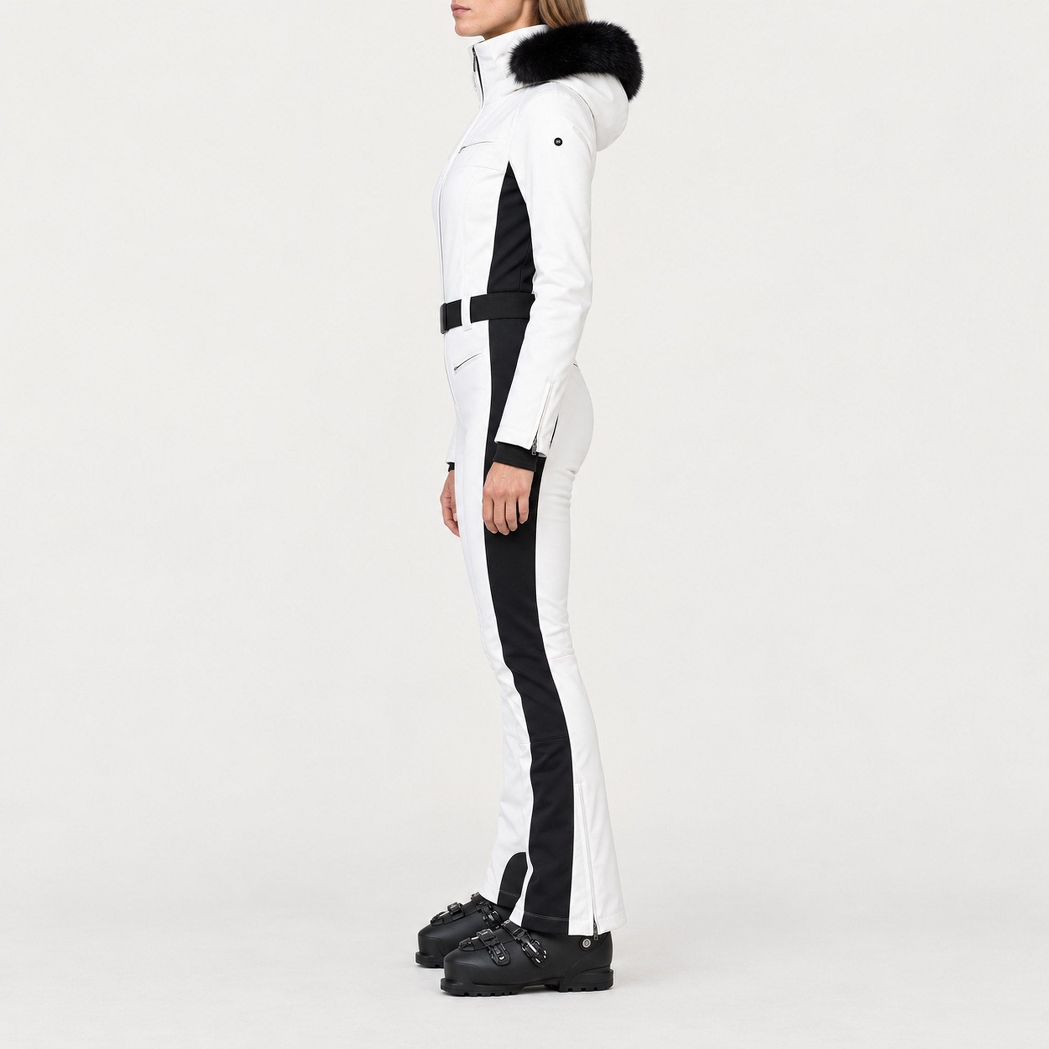 Goldbergh womens Parry Ski Suit in White (Snow White) - model side. AI-generated from manufacturer imagery.