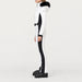 Goldbergh womens Parry Ski Suit in White (Snow White) - model side. AI-generated from manufacturer imagery.