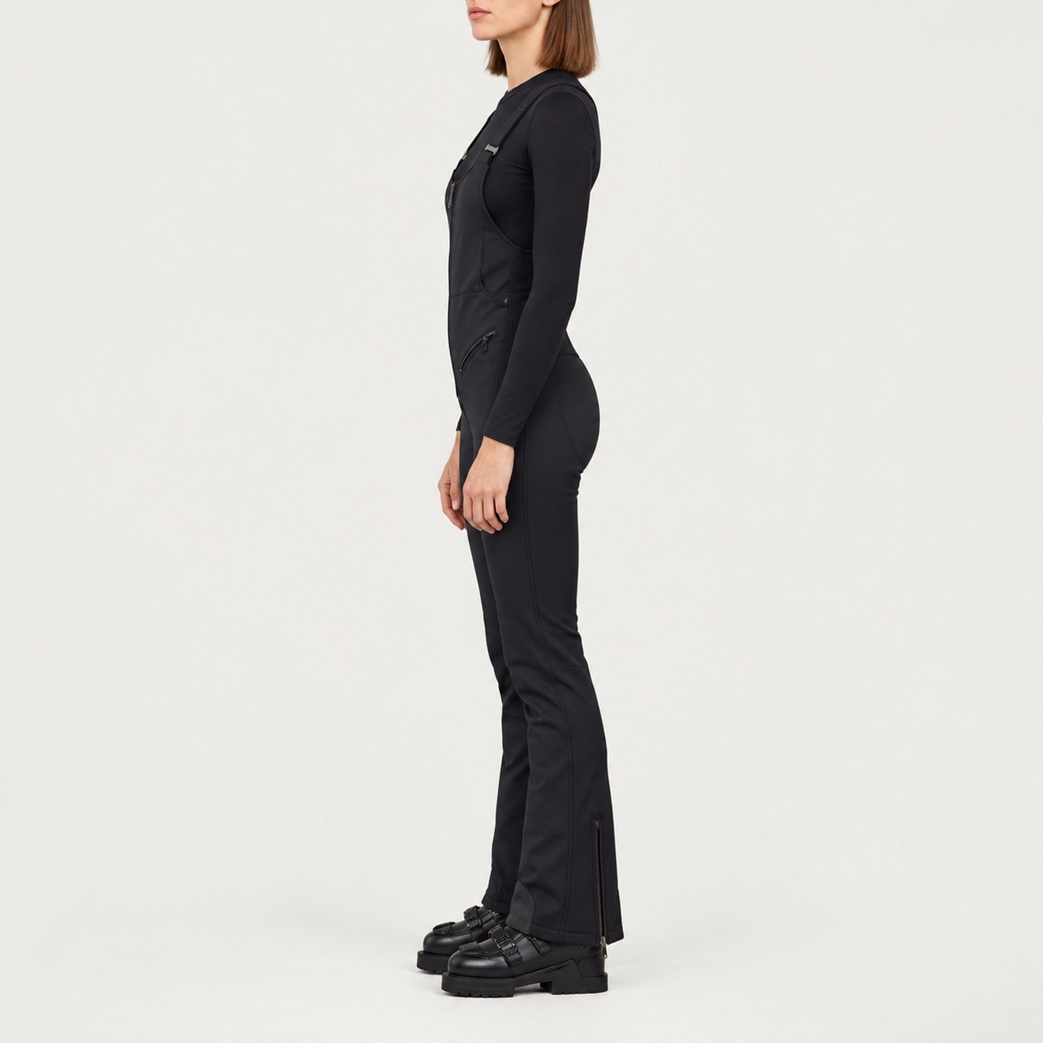 Goldbergh womens Phoebe Salopettes in Black (Black) - model side. AI-generated from manufacturer imagery.