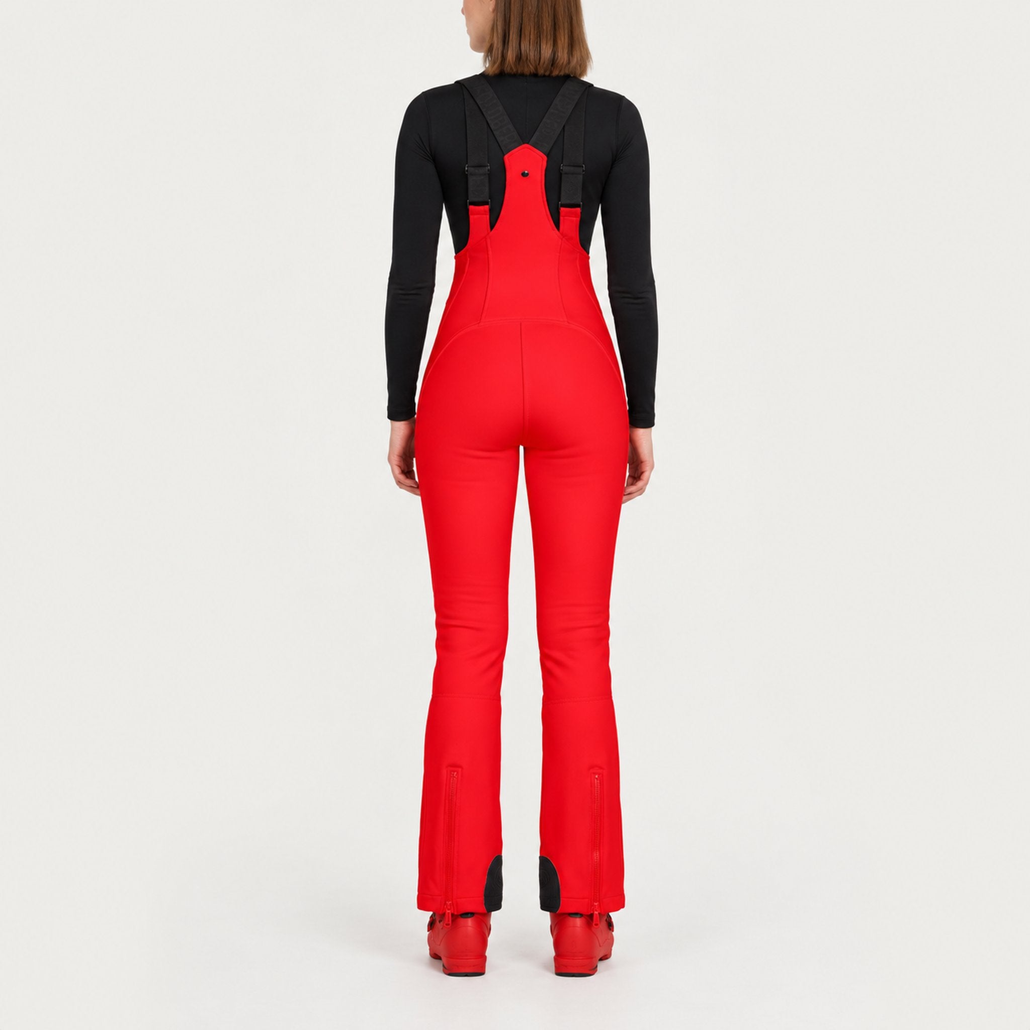 Goldbergh womens Phoebe Salopettes in Flame Red (Flame) - model back. AI-generated from manufacturer imagery.