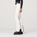 Goldbergh womens Pippa Ski Pants in White (Snow White) - model side. AI-generated from manufacturer imagery.