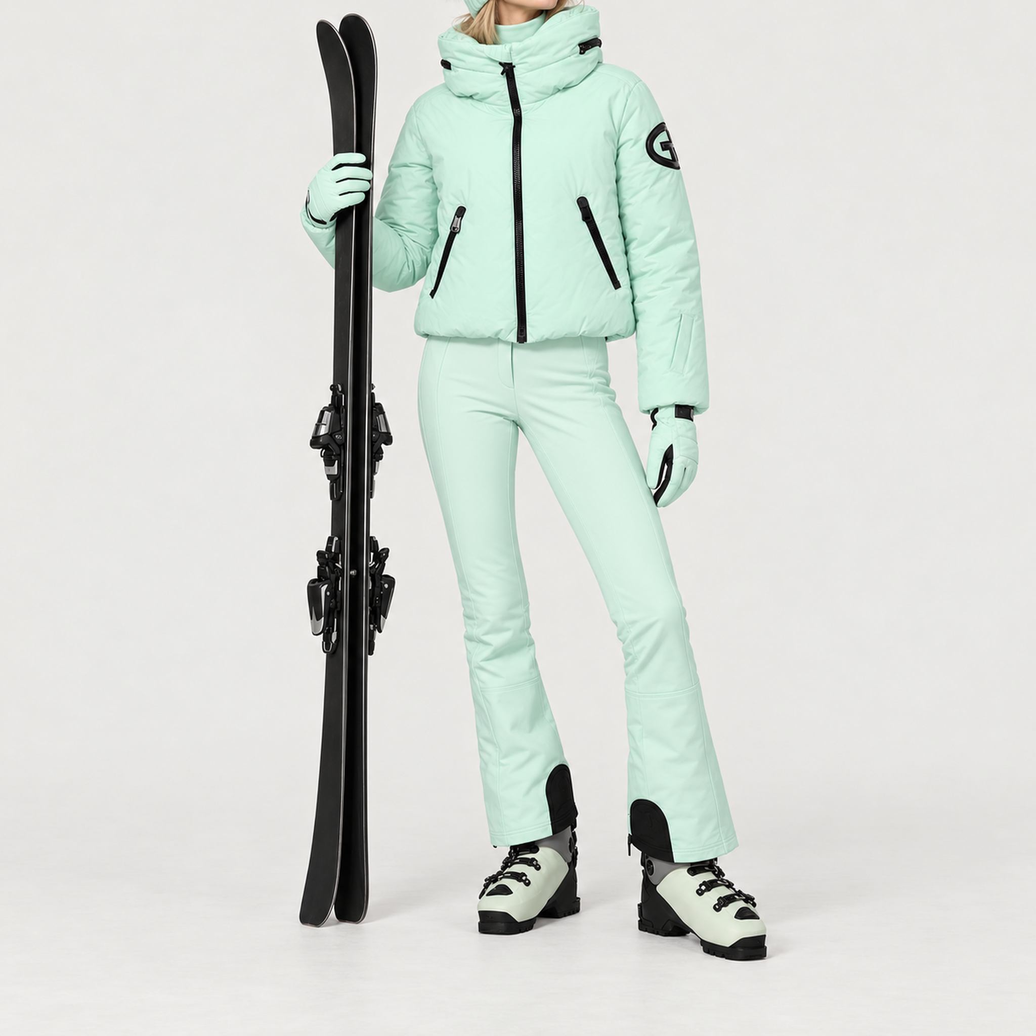 Goldbergh women's Porter Ski Jacket in Matcha Mint – ski pose view. AI-generated from manufacturer imagery.