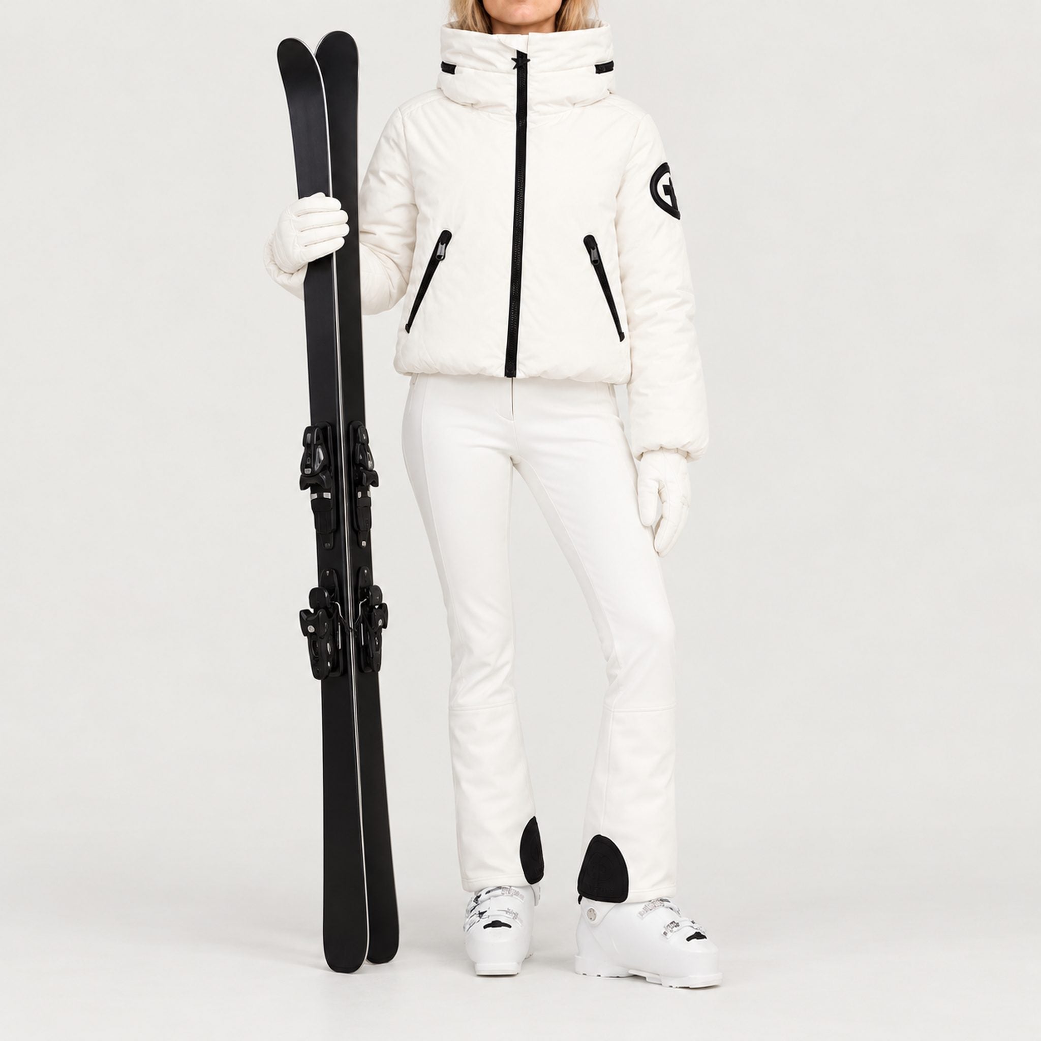 Goldbergh women's Porter Ski Jacket in White – ski pose view. AI-generated from manufacturer imagery.