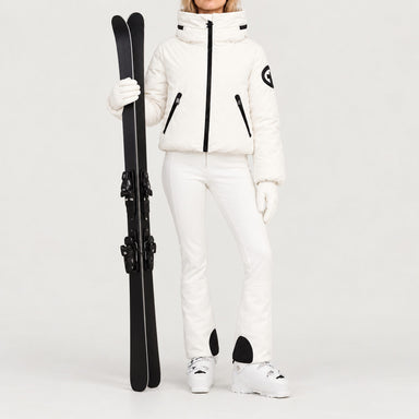 Goldbergh women's Porter Ski Jacket in White – ski pose view. AI-generated from manufacturer imagery.