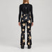 Goldbergh Sakuya Ski Pants Ski Pants in Black Gold — model back. AI-generated from manufacturer reference photographs.