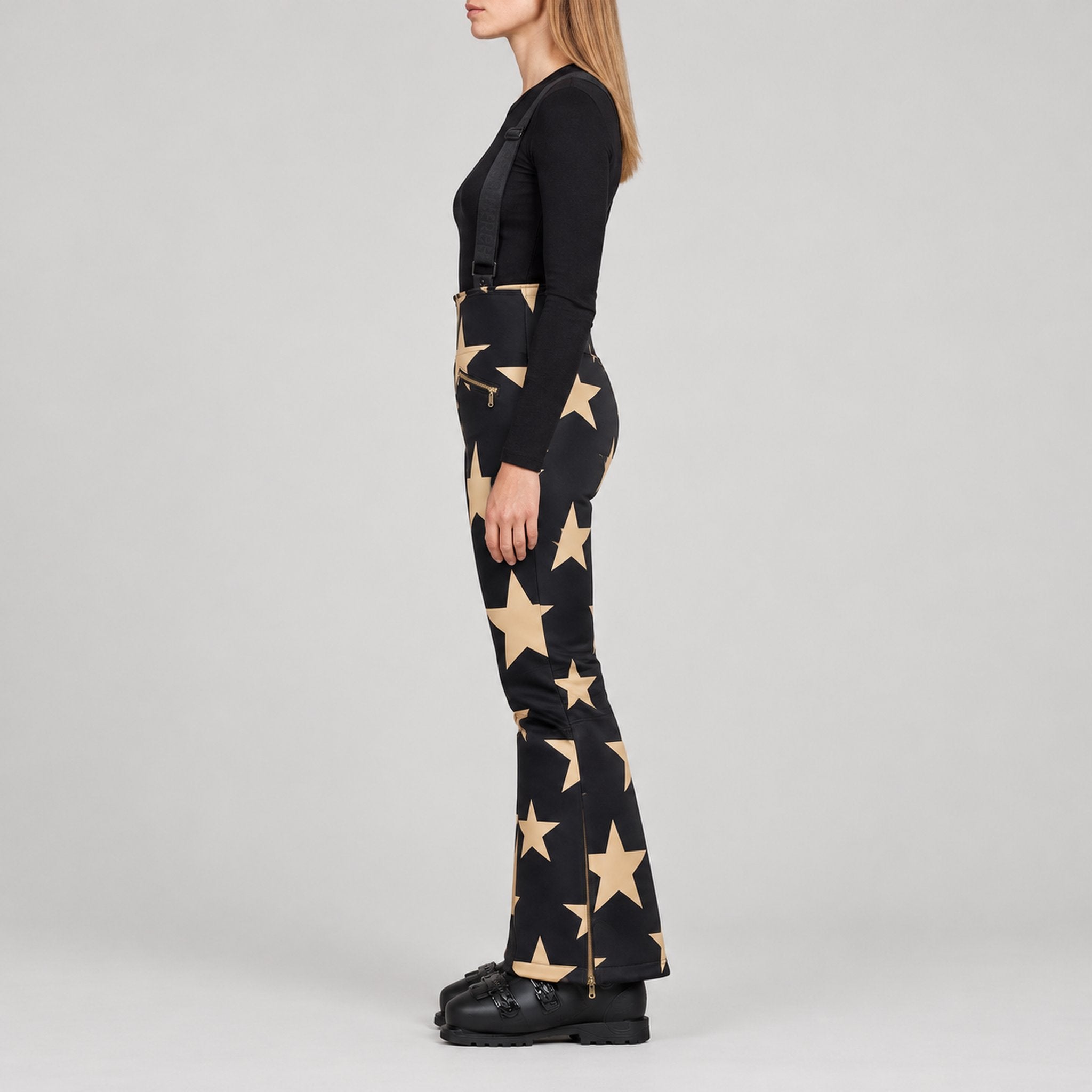 Goldbergh Sakuya Ski Pants Ski Pants in Black Gold — model side. AI-generated from manufacturer reference photographs.