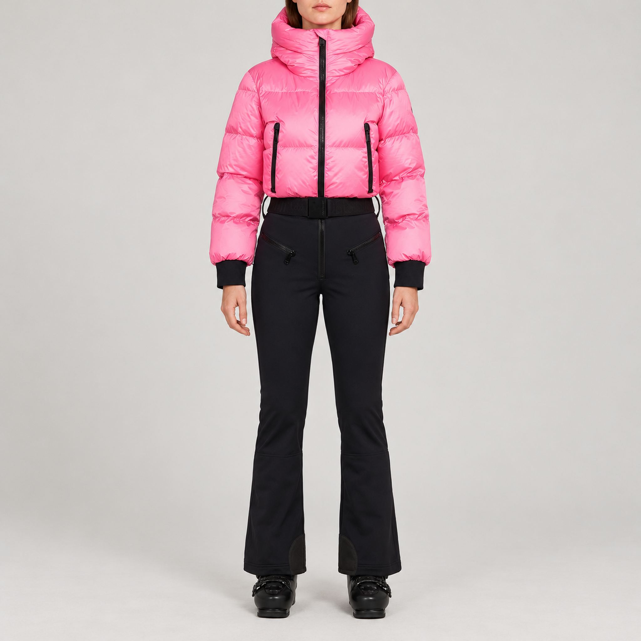 Goldbergh Sayaka Ski Suit in Pink Cosmos — model front. AI-generated from manufacturer reference photographs.