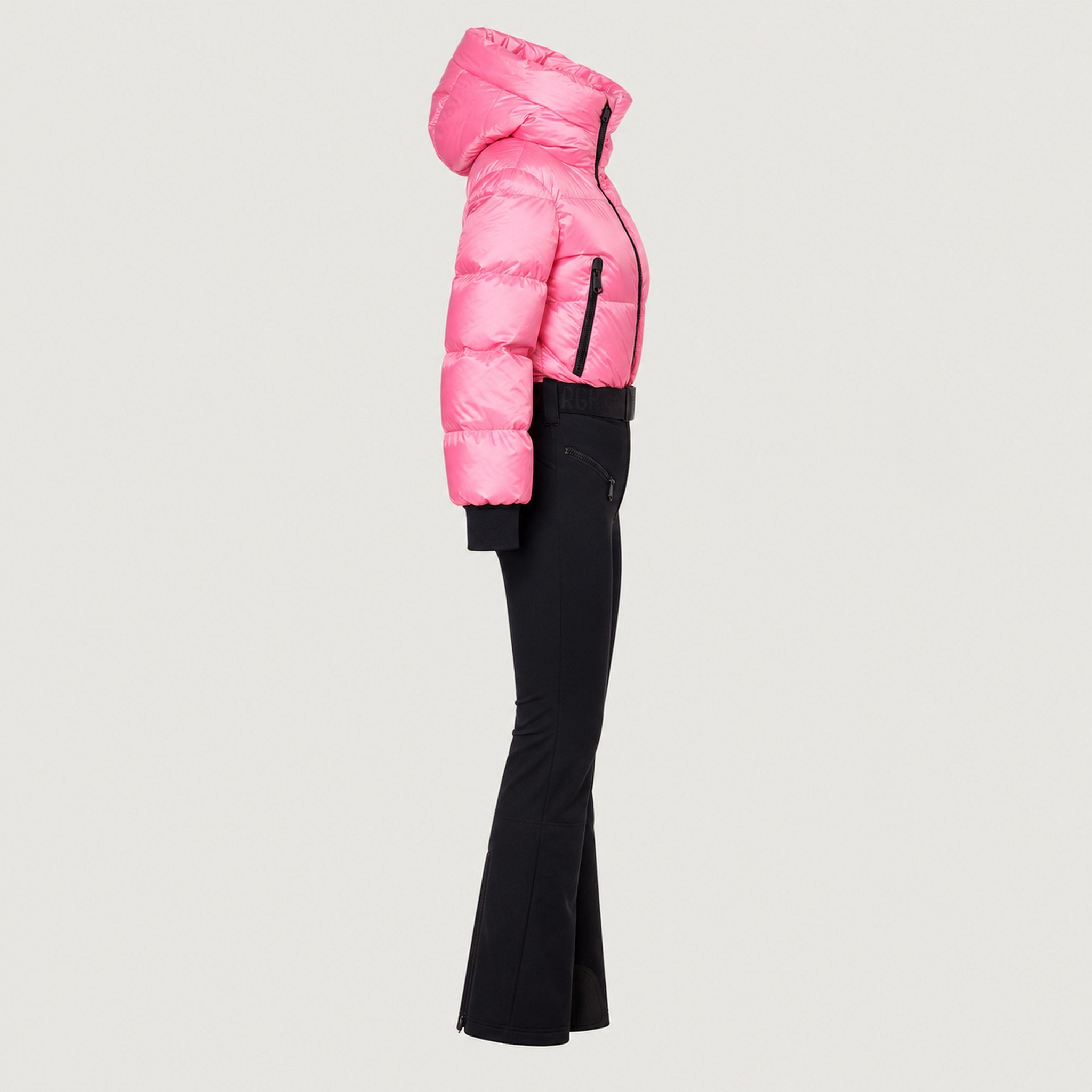 Goldbergh Sayaka Ski Suit in Pink Cosmos — side. AI-generated from manufacturer reference photographs.