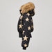 Goldbergh Shinnen Ski Jacket in Black Gold — side. AI-generated from manufacturer reference photographs.