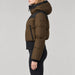 Goldbergh Village Ski Jacket in Army in Army — model side. AI-generated from manufacturer reference photographs.