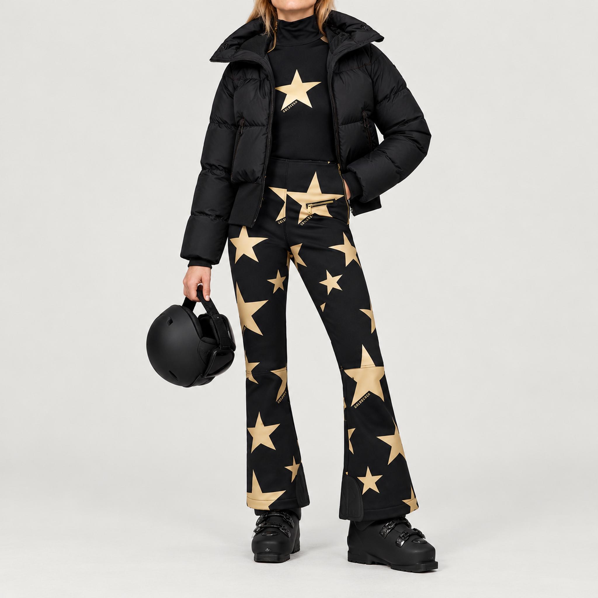Goldbergh women's Village Ski Jacket in Black – ski pose view. AI-generated from manufacturer imagery.