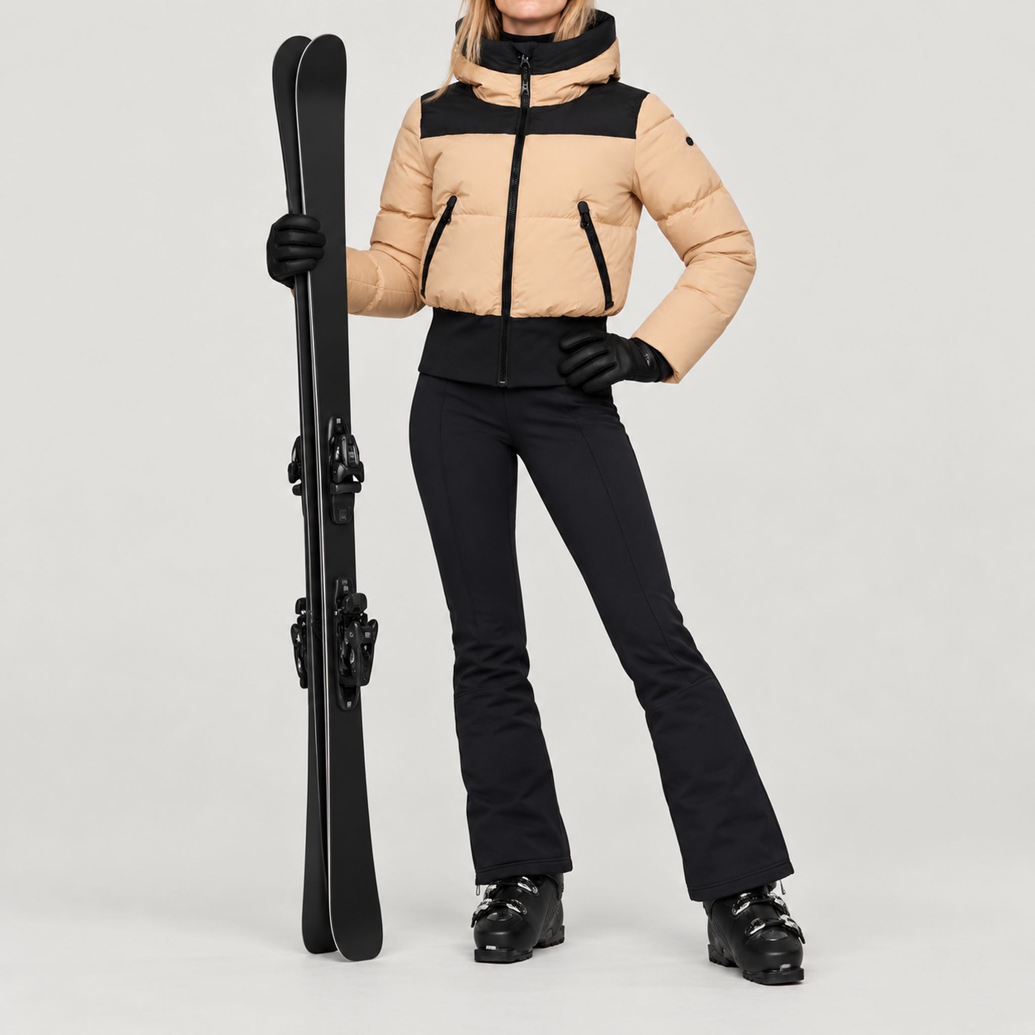 Goldbergh women's Village Ski Jacket in Lark – ski pose view. AI-generated from manufacturer imagery.