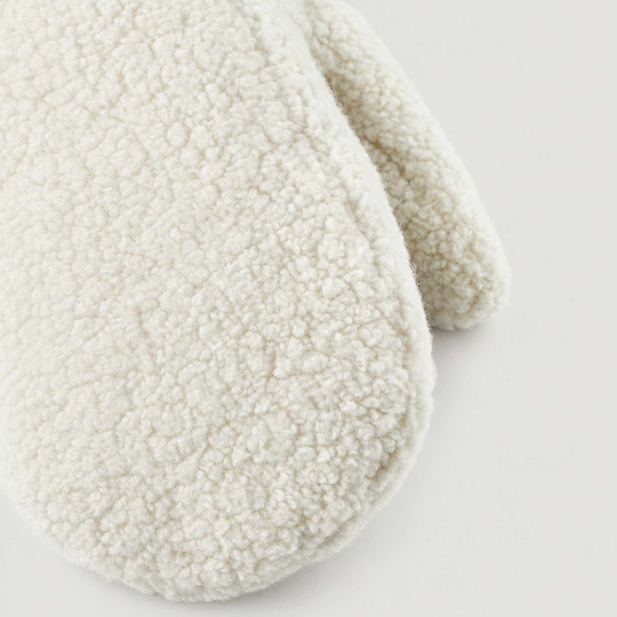Hestra unisex Alta Mitt in Off White - fleece texture detail. AI-generated from Hestra product photography.