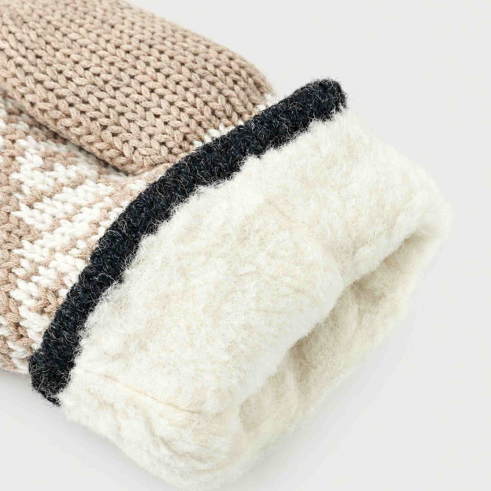 Hestra unisex Nordic Wool Mitt (Natural) - product detail view 4. AI-generated from manufacturer imagery.