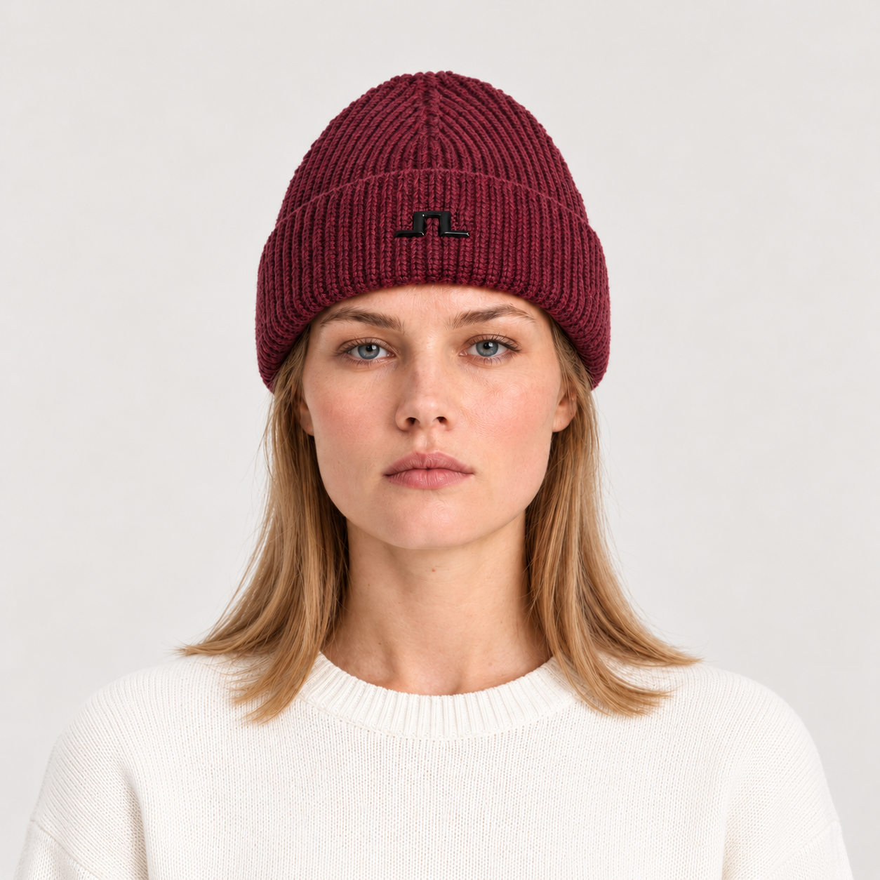 J Lindeberg Merino Beanie in Winetasting, female front