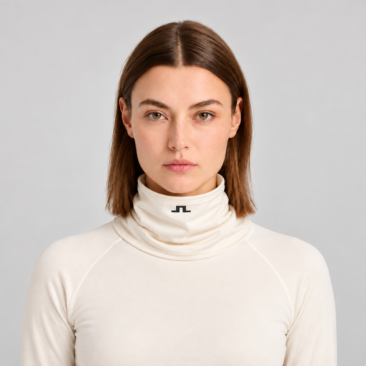 J Lindeberg Rise Neck Gaiter in Moonbeam, female front