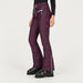 Jetset women's Tiby Ski Pants in Bordeaux Wine — model side