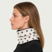 Newland unisex Eluna Neck Gaiter in Off White - womens side. AI-generated from supplied artwork.