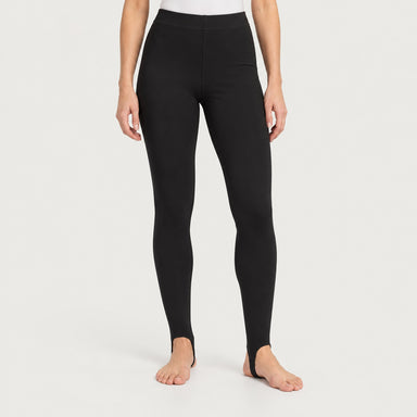 Newland womens Alpette Skinny Ski Pants in Black - model front. AI-generated from supplied artwork.