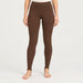 Newland womens Alpette Skinny Ski Pants in Brown - model front. AI-generated from supplied artwork.