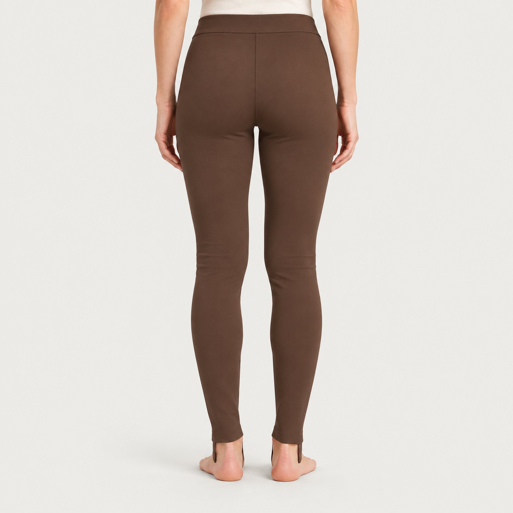 Newland womens Alpette Skinny Ski Pants in Brown - model back. AI-generated from supplied artwork.