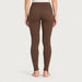 Newland womens Alpette Skinny Ski Pants in Brown - model back. AI-generated from supplied artwork.