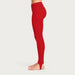 Newland womens Alpette Skinny Ski Pants in Red - model side. AI-generated from supplied artwork.