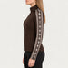 Newland womens Caelys Padded Full Zip in Brown - model side. AI-generated from supplied artwork.