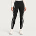 Newland womens Calith Leggings in Black - model front. AI-generated from supplied artwork.