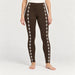 Newland womens Calith Leggings in Brown - model front. AI-generated from supplied artwork.