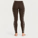 Newland womens Calith Leggings in Brown - model back. AI-generated from supplied artwork.