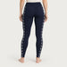 Newland womens Calith Leggings in Navy - model back. AI-generated from supplied artwork.