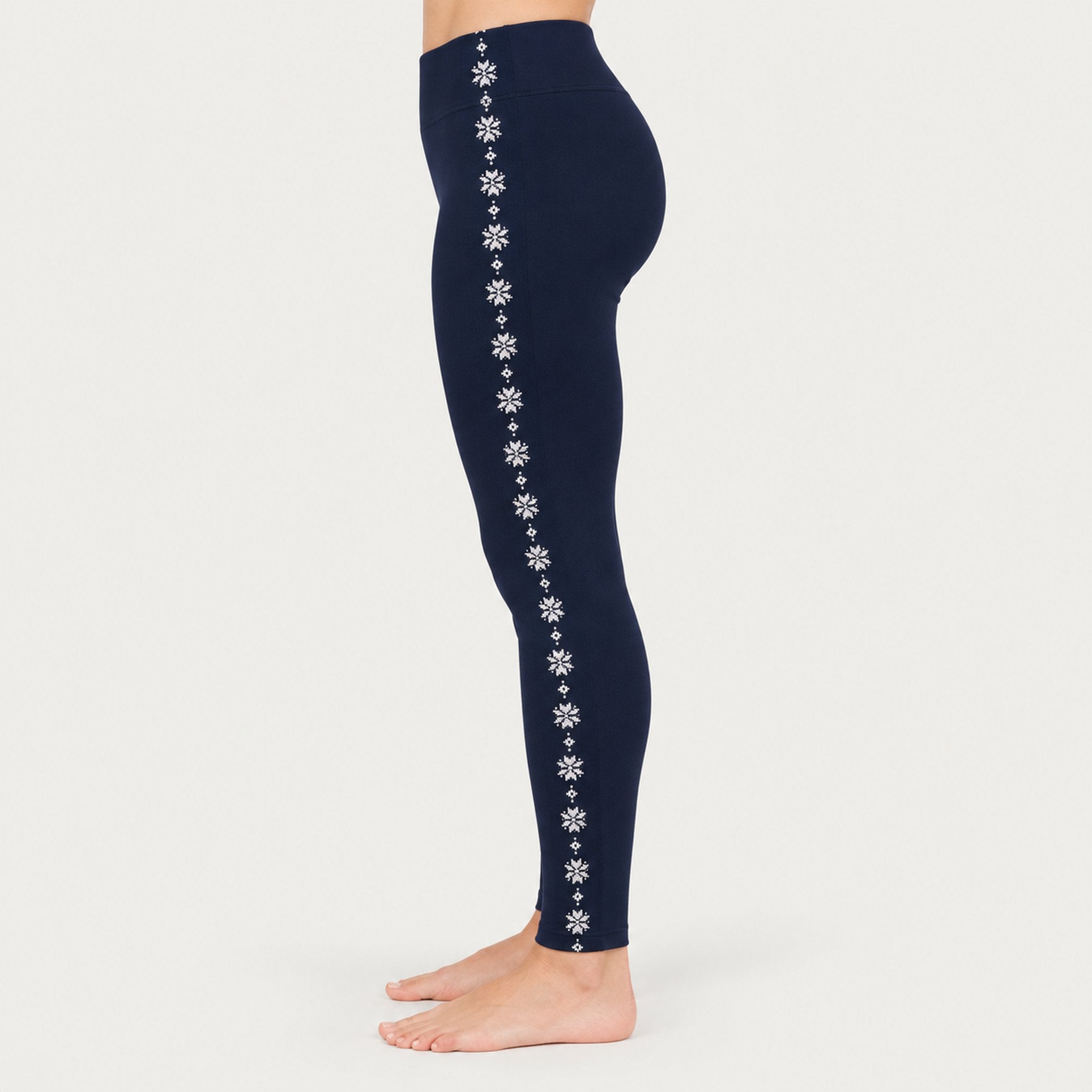 Newland womens Calith Leggings in Navy - model side. AI-generated from supplied artwork.