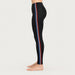 Newland womens Mirny Leggings - model side. AI-generated from supplied artwork.
