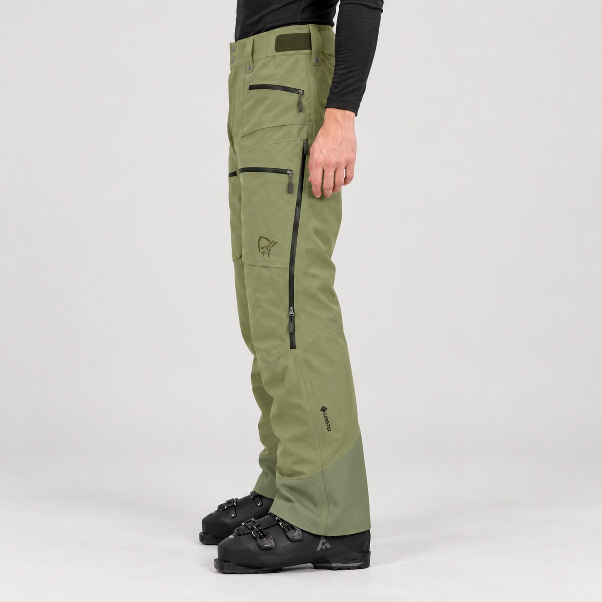 Norrøna men's Lofoten Gore-Tex Ski Pants in Deep Lichen Green – model side