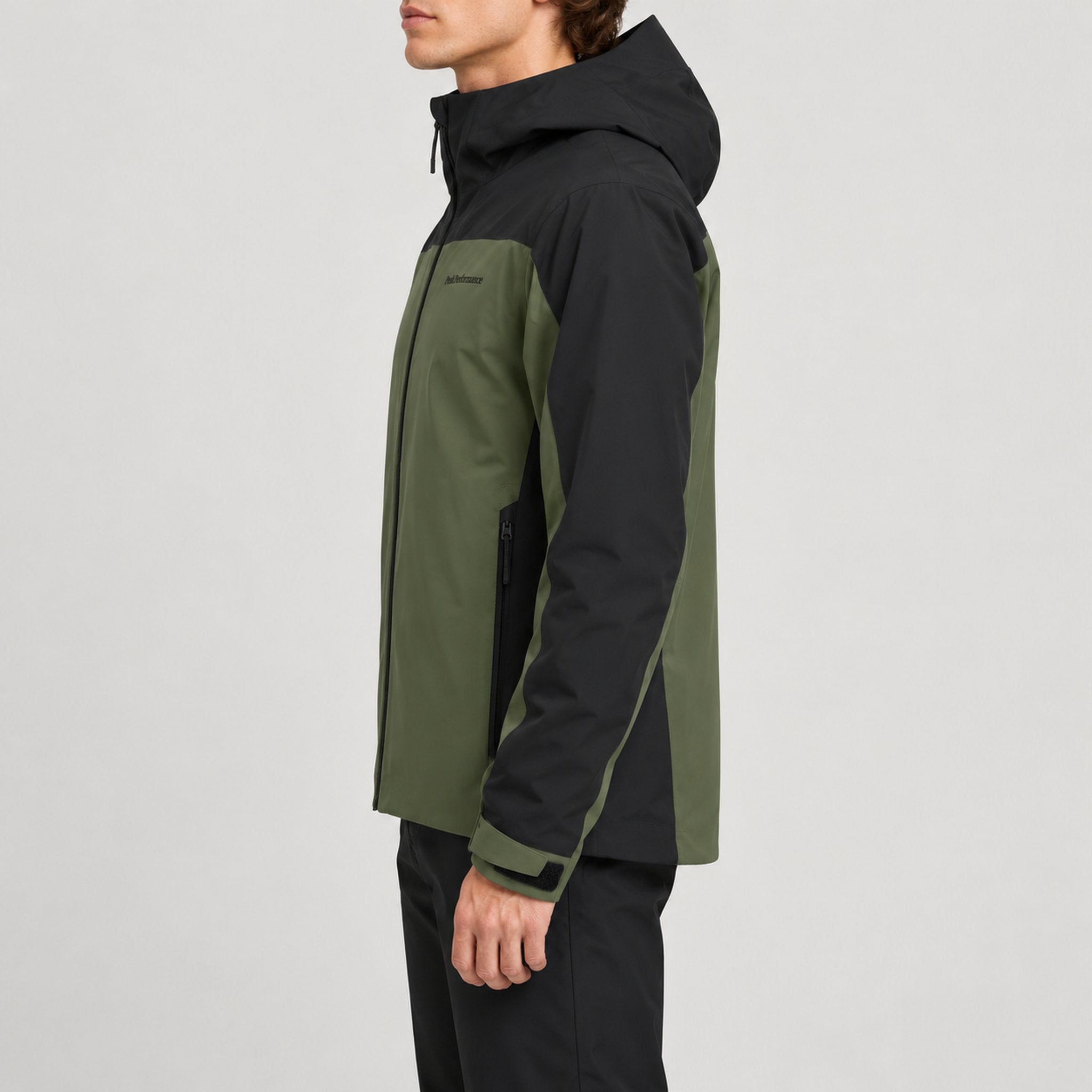 Peak Performance men's Maroon Ski Jacket in Pine Needle/Black – model side