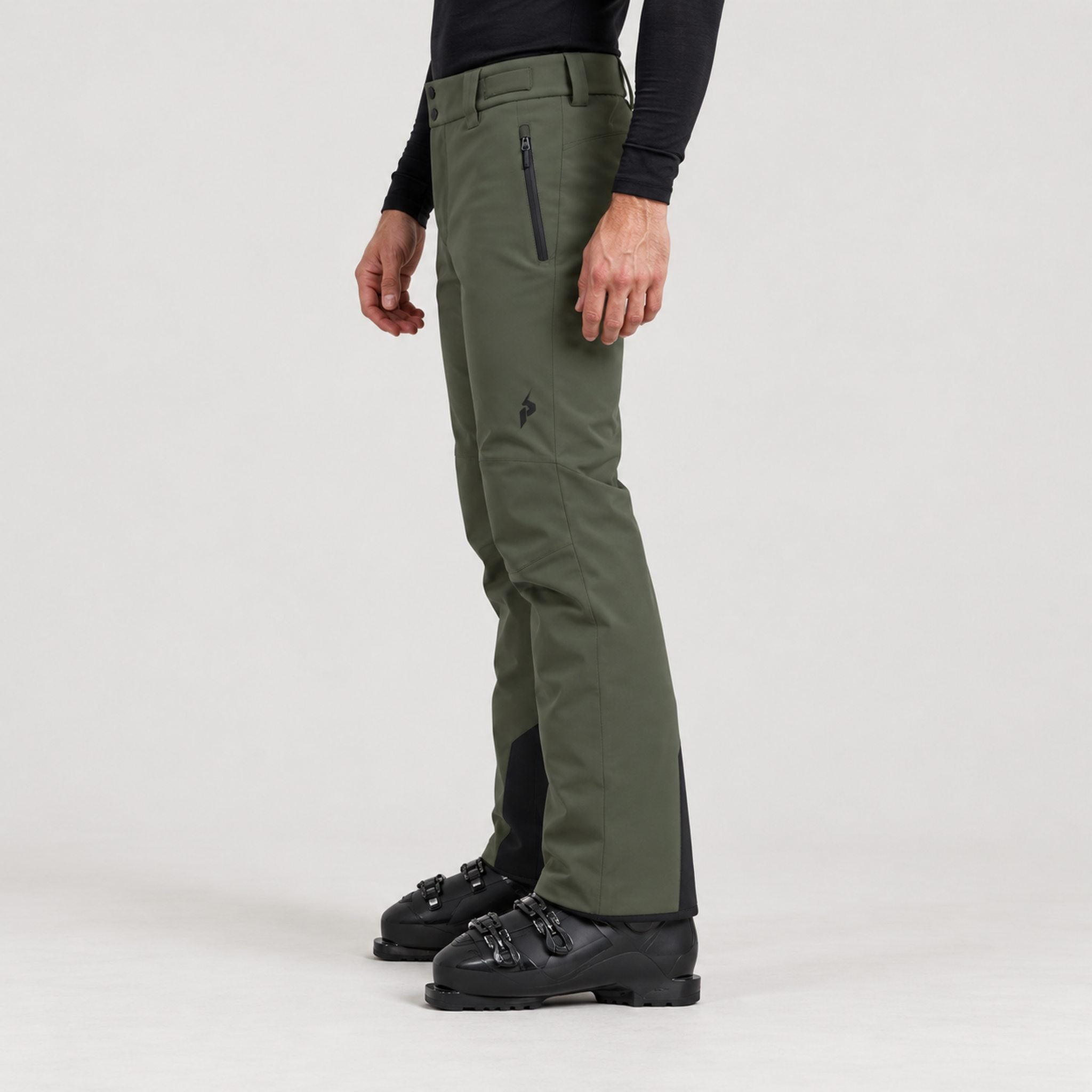 Peak Performance men's Maroon Ski Pants in Pine Needle – model side