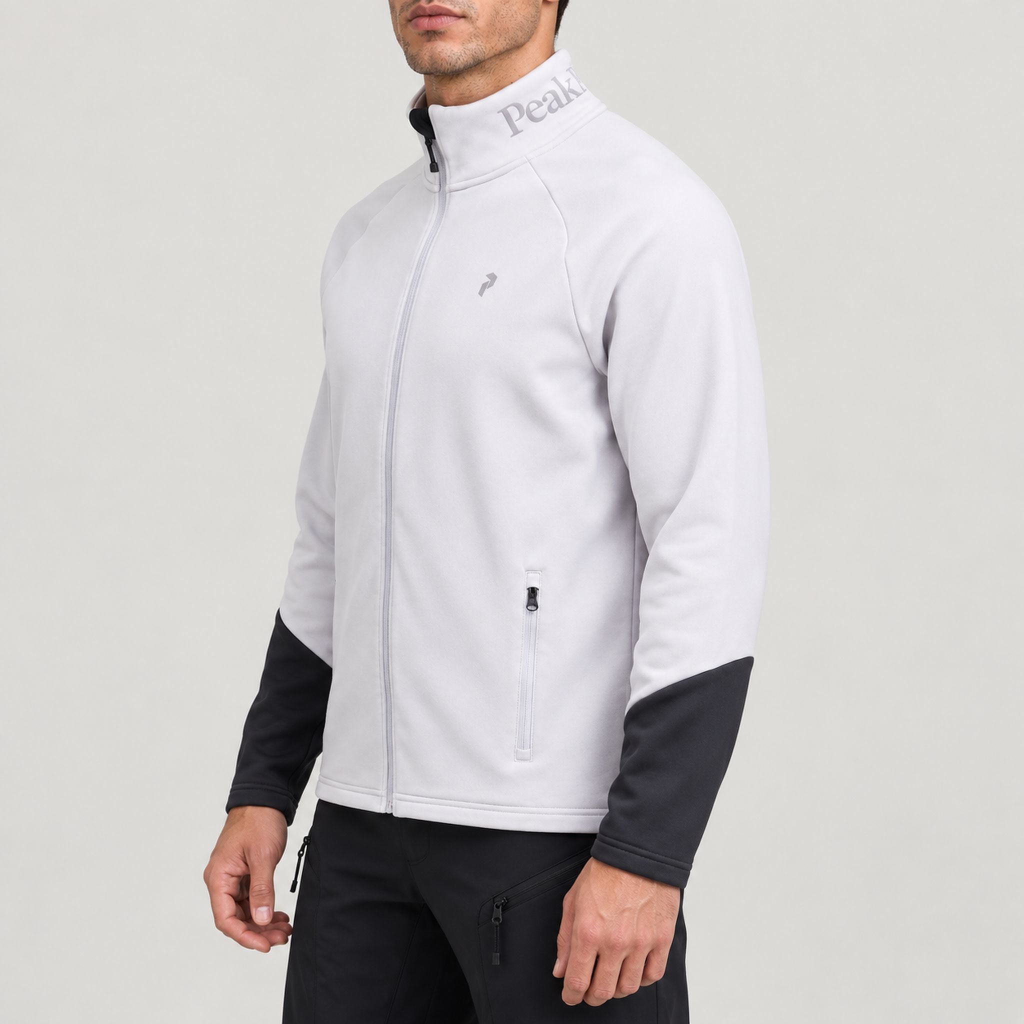 Peak Performance men's Rider Full Zip in Antarctica/Motion Grey – model side