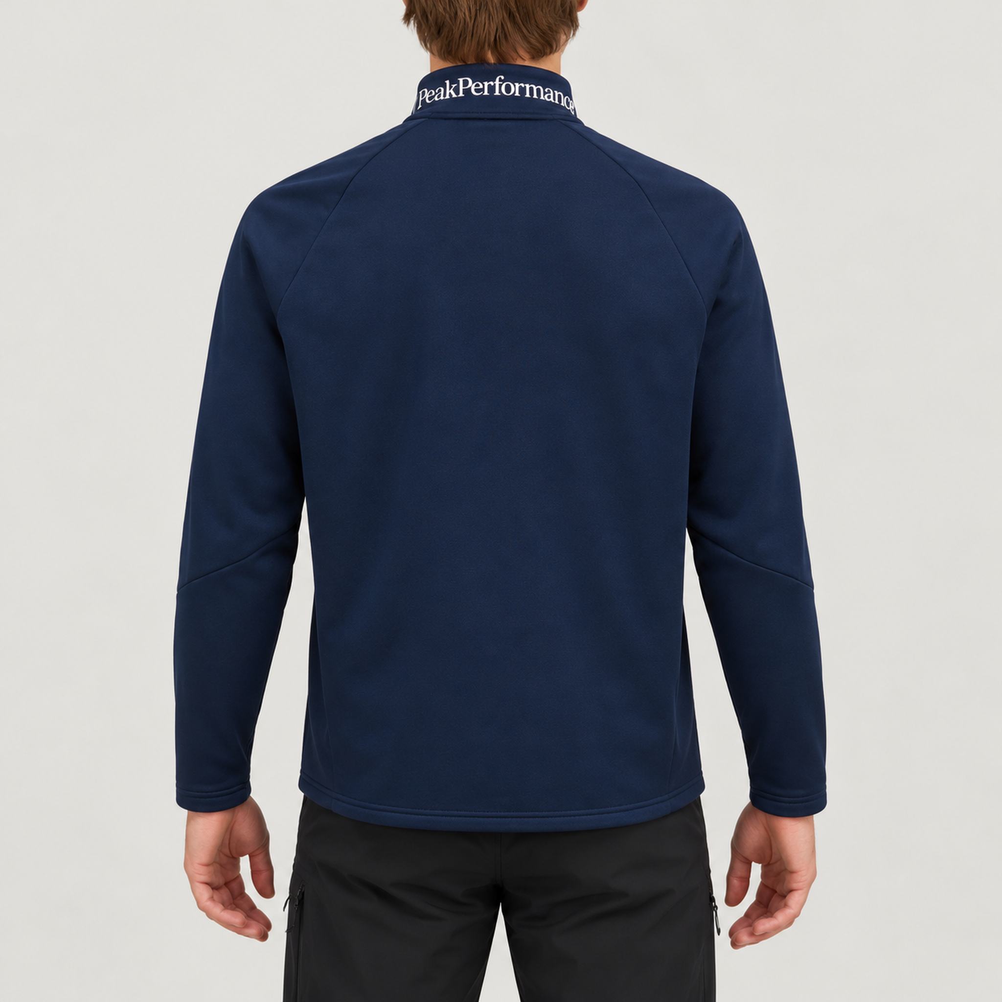 Peak Performance men's Rider Full Zip in Blue Shadow – model back