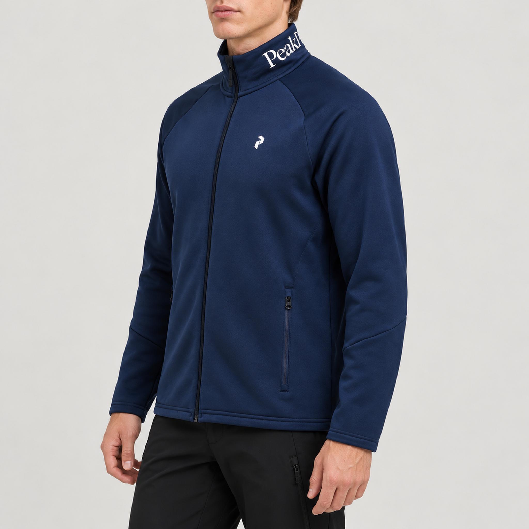 Peak Performance men's Rider Full Zip in Blue Shadow – model side