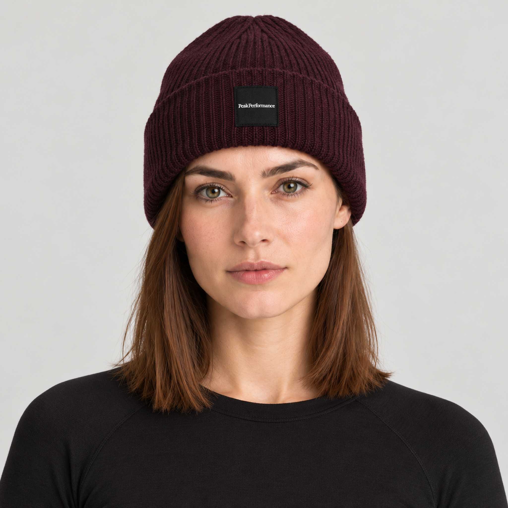 Peak Performance unisex Cornice Hat in Porto – female front